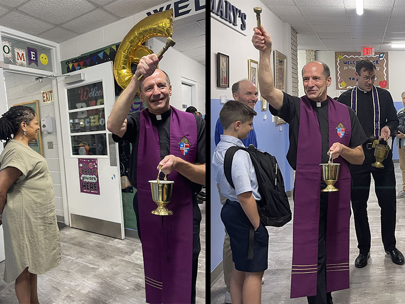 Priest smiling while blessing backpacks
